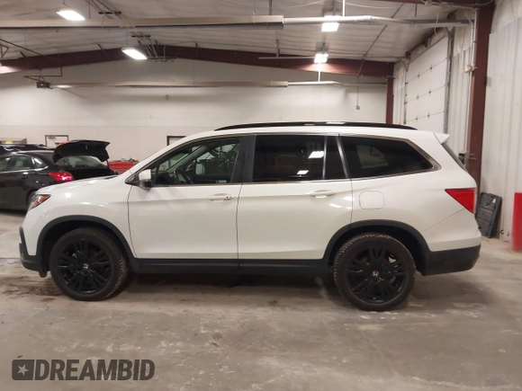 2021 Honda Pilot Special Edition with VIN 5FNYF6H2XMB054312, listed as a IAAI auction lot 41828508 with 115,652 mi miles and . Bid and sale history available at DreamBid. Image 14.