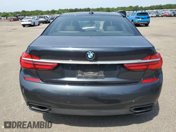 2019 BMW 7 Series 740i xDrive z VIN WBA7E4C56KGV71028, wystawiony jako Copart lot #76860474 z przebiegiem 66 657 mil mil oraz Nie do naprawy • Non repairable. Historia ofert i sprzedaży dostępna na DreamBid. Obrazek 6.