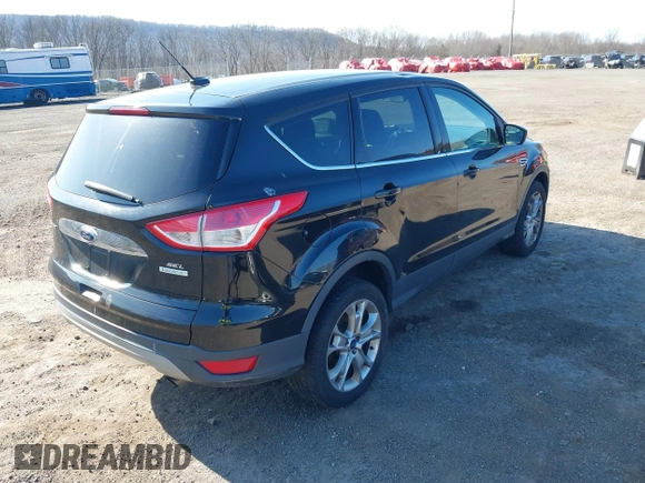 2013 Ford Escape SEL with VIN 1FMCU9HX5DUC58726, listed as a IAAI auction lot 41766493 with 219,093 mi miles. Bid and sale history available at carsss.com. Image 4.