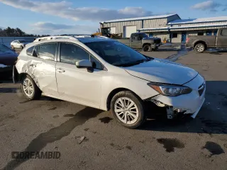 2017 Subaru Impreza Premium with VIN 4S3GTAD68H3732039, listed as a Copart auction lot 44581315 with 104,388 mi miles and Salvage title. Bid and sale history available at DreamBid. Image 4.