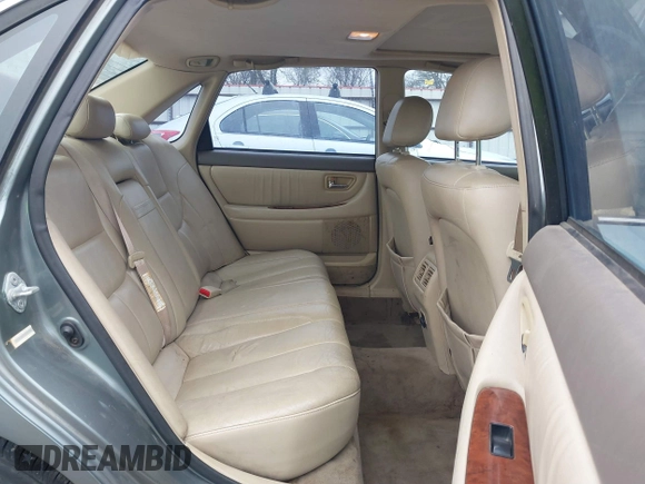 2002 Toyota Avalon XL with VIN 4T1BF28BX2U262186, listed as a IAAI auction lot 41572610 with 164,899 mi miles and . Bid and sale history available at DreamBid. Image 8.