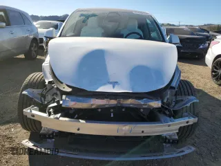 2024 Tesla Model Y Long Range with VIN 7SAYGDEE3RA257999, listed as a Copart auction lot 41838105 with 17,013 mi miles and Salvage Title. Bid and sale history available at DreamBid. Image 5.