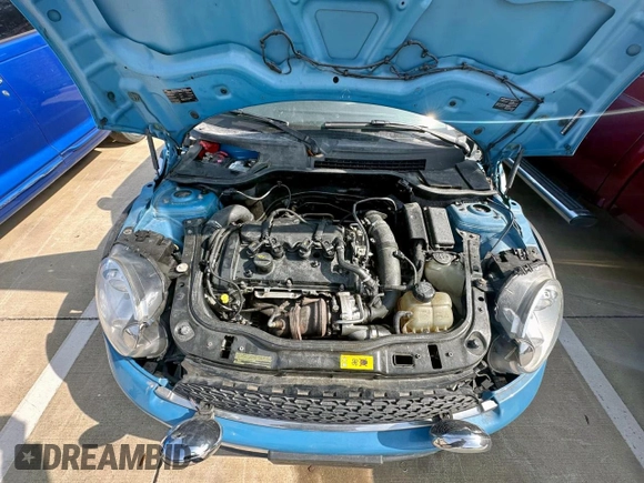 2014 MINI Convertible S z VIN WMWZP3C57ET706977, wystawiony jako Copart lot #45777855 z przebiegiem 77 175 mil mil oraz Czysty tytuł • Clean title. Historia ofert i sprzedaży dostępna na DreamBid. Obrazek 7.