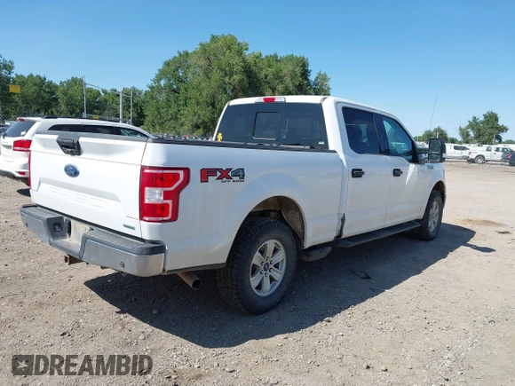 2020 Ford F-150 XL with VIN 1FTFW1E42LKD82678, listed as a IAAI auction lot 42577600 with 141,787 mi miles and . Bid and sale history available at DreamBid. Image 4.