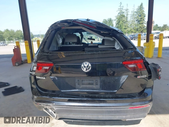 2021 Volkswagen Tiguan S with VIN 3VV0B7AX1MM098300, listed as a IAAI auction lot 42574636 with 53,559 mi miles and . Bid and sale history available at DreamBid. Image 16.