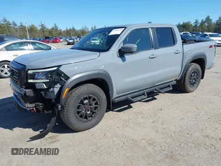 2022 Nissan Frontier SV z VIN 1N6ED1EKXNN659026, wystawiony jako IAAI lot #42050476 z przebiegiem 26 183 mil mil oraz . Historia ofert i sprzedaży dostępna na DreamBid. Obrazek 22.