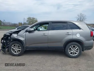 2015 Kia Sorento LX with VIN 5XYKTCA66FG570155, listed as a IAAI auction lot 42123965 with 110,748 mi miles and . Bid and sale history available at carsss.com. Image 14.