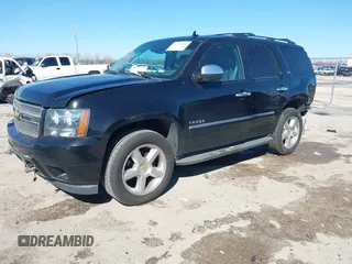 2013 Chevrolet Tahoe LTZ with VIN 1GNSKCE0XDR350970, listed as a IAAI auction lot 41704253 with 126,653 mi miles and . Bid and sale history available at DreamBid. Image 18.
