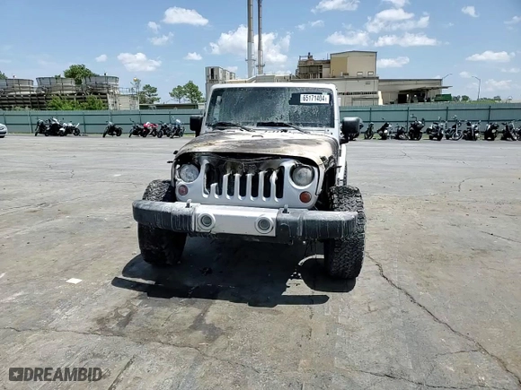 2011 Jeep Wrangler Unlimited Sahara with VIN 1J4BA5H14BL613895, listed as a Copart auction lot 65171404 with 0 mi miles and Non Repairable. Bid and sale history available at carsss.com. Image 10.