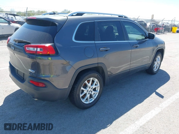 2014 Jeep Cherokee Latitude with VIN 1C4PJMCS2EW137767, listed as a IAAI auction lot 42052071 with 165,300 mi miles and . Bid and sale history available at DreamBid. Image 4.