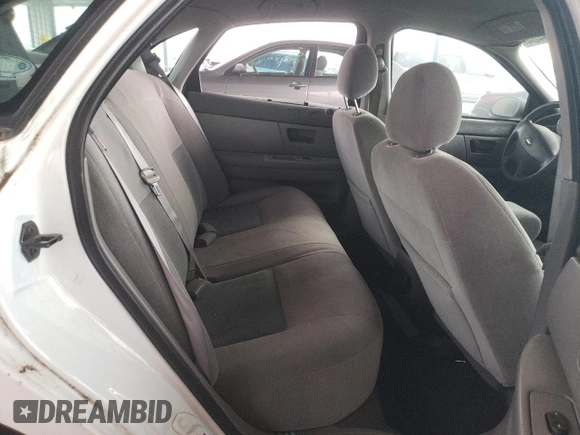2003 Ford Taurus LX Standard with VIN 1FAFP52U53G280700, listed as a Copart auction lot 87488014 with 128,020 mi miles and Salvage title. Bid and sale history available at DreamBid. Image 10.