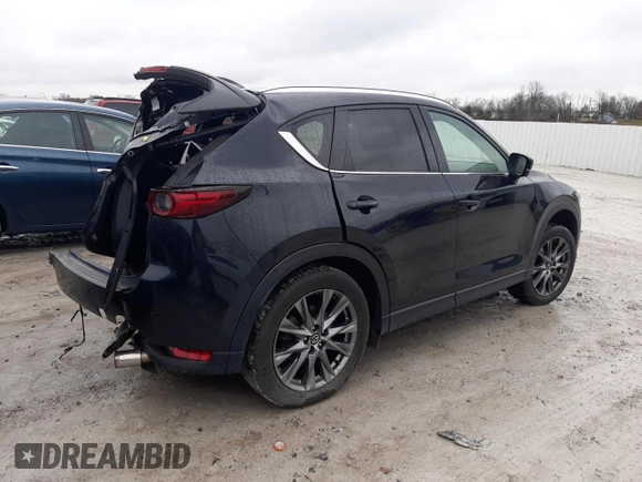 2021 Mazda CX-5 Signature with VIN JM3KFBEY8M0436075, listed as a Copart auction lot 85061194 with 66,471 mi miles and Salvage Title. Bid and sale history available at carsss.com. Image 3.