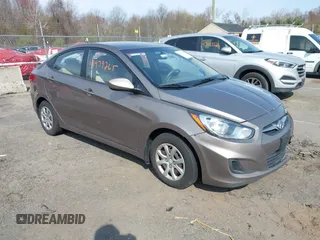 2013 Hyundai Accent GLS with VIN KMHCT4AE1DU314191, listed as a IAAI auction lot 41979265 with 177,944 mi miles. Bid and sale history available at carsss.com. Image 1.