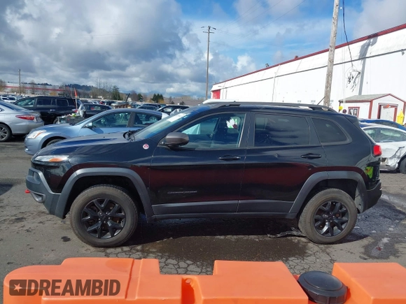 2015 Jeep Cherokee Trailhawk with VIN 1C4PJMBS7FW699392, listed as a IAAI auction lot 41797617 with 1 mi miles. Bid and sale history available at carsss.com. Image 14.