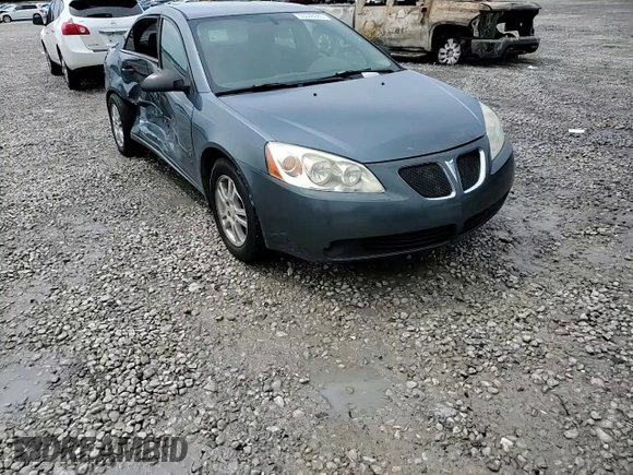 2006 Pontiac G6 6-Cyl z VIN 1G2ZG558064174395, wystawiony jako Copart lot #55348985 z przebiegiem 201 150 mil mil oraz Szkoda całkowita • Salvage title. Historia ofert i sprzedaży dostępna na DreamBid. Obrazek 13.