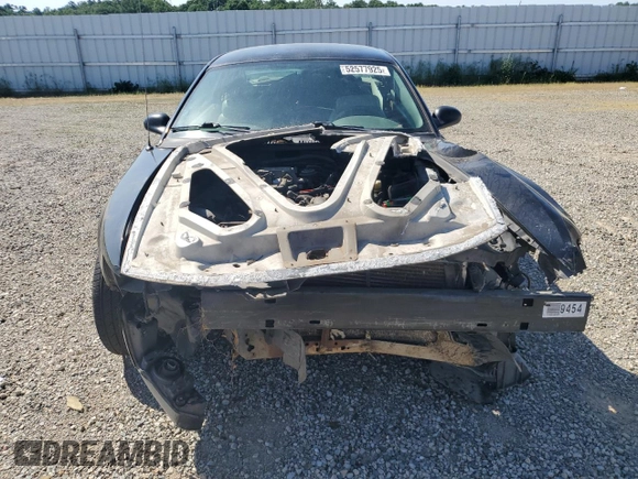 2004 Ford Mustang GT Deluxe z VIN 1FAFP42X64F137315, wystawiony jako Copart lot #52577925 z przebiegiem 210 557 mil mil oraz Szkoda całkowita • Salvage title. Historia ofert i sprzedaży dostępna na DreamBid. Obrazek 5.