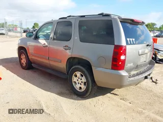 2007 Chevrolet Tahoe LS z VIN 1GNFC13027R231885, wystawiony jako IAAI lot #42750247 z przebiegiem 167 072 mil mil oraz . Historia ofert i sprzedaży dostępna na DreamBid. Obrazek 3.