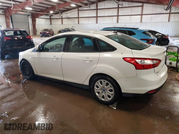 2012 Ford Focus SE with VIN 1FAHP3F26CL329142, listed as a Copart auction lot 57951835 with 159,656 mi miles and Clean title. Bid and sale history available at DreamBid. Image 2.