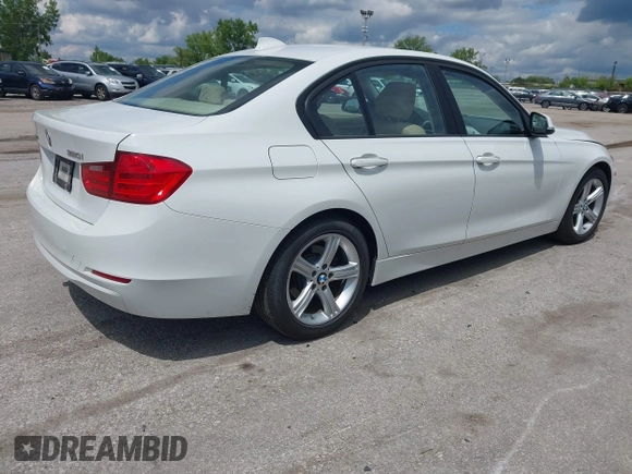 2013 BMW 3 Series 320i xDrive with VIN WBA3C3C53DF979770, listed as a IAAI auction lot 42373648 with 151,142 mi miles and . Bid and sale history available at DreamBid. Image 4.