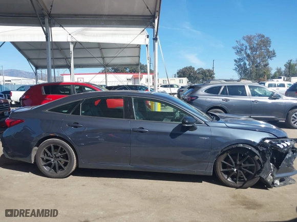 2019 Toyota Avalon Hybrid Limited with VIN 4T1B21FB9KU004539, listed as a IAAI auction lot 41784328 with 99,811 mi miles. Bid and sale history available at carsss.com. Image 13.