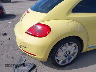 2012 Volkswagen Beetle 2.5L with VIN 3VWJX7AT9CM651806, listed as a IAAI auction lot 41912080 with 143,195 mi miles. Bid and sale history available at carsss.com. Image 12.