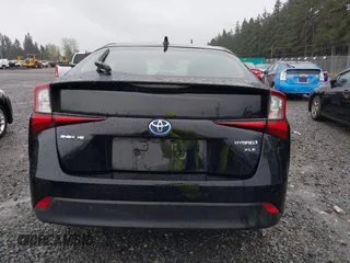 2022 Toyota Prius L Eco with VIN JTDKAMFU2N3154674, listed as a IAAI auction lot 41977505 with 61,552 mi miles and . Bid and sale history available at DreamBid. Image 17.