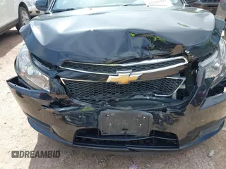 2014 Chevrolet Cruze 1LT with VIN 1G1PC5SB5E7433631, listed as a IAAI auction lot 42518491 with 99,962 mi miles and . Bid and sale history available at DreamBid. Image 6.