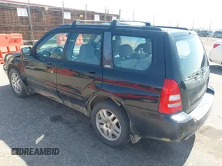 2003 Subaru Forester XS with VIN JF1SG65633H730386, listed as a IAAI auction lot 42084706 with 199,602 mi miles. Bid and sale history available at carsss.com. Image 3.