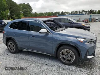 2023 BMW X1 xDrive28i with VIN WBX73EF08P5W51452, listed as a Copart auction lot 58420175 with 30,404 mi miles and Salvage title. Bid and sale history available at DreamBid. Image 4.