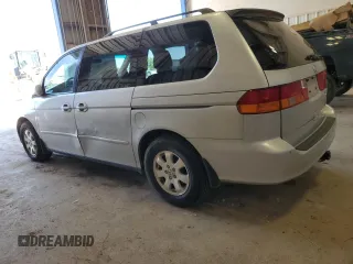 2002 Honda Odyssey EX z VIN 5FNRL18622B049511, wystawiony jako Copart lot #55265485 z przebiegiem 208 693 mil mil oraz Czysty tytuł • Clean title. Historia ofert i sprzedaży dostępna na DreamBid. Obrazek 2.