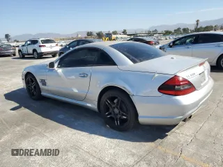 2009 Mercedes-Benz SL 550 z VIN WDBSK71F09F143733, wystawiony jako Copart lot #69045444 z przebiegiem 114 251 mil mil oraz Szkoda całkowita • Salvage title. Historia ofert i sprzedaży dostępna na DreamBid. Obrazek 2.