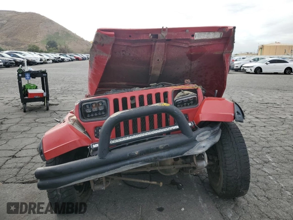 1995 Jeep Wrangler S with VIN 1J4FY19P2SP254595, listed as a Copart auction lot 82430184 with 130,942 mi miles and Salvage Title. Bid and sale history available at carsss.com. Image 5.