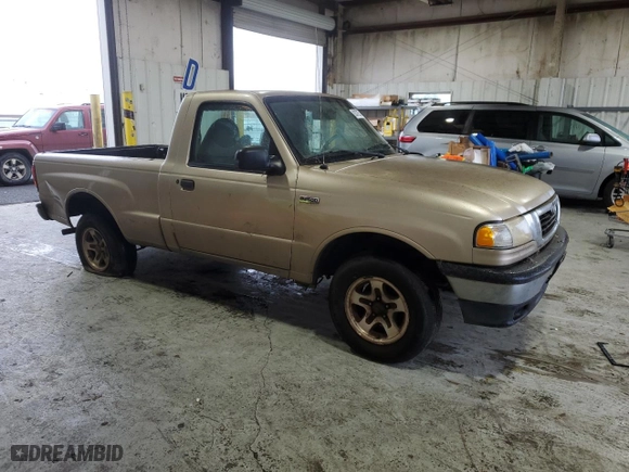 2000 Mazda B-Series 2WD Truck SX with VIN 4F4YR12C1YTM19515, listed as a Copart auction lot 82472574 with 357,701 mi miles and Clean Title. Bid and sale history available at carsss.com. Image 4.