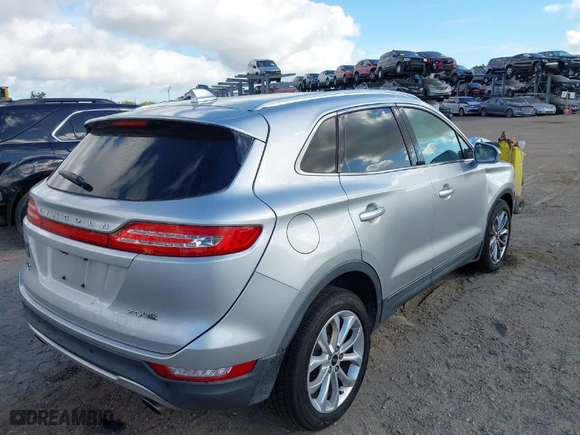 2016 Lincoln MKC Select with VIN 5LMCJ2D99GUJ05484, listed as a IAAI auction lot 41834395 with NaN miles. Bid and sale history available at carsss.com. Image 4.