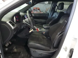 2019 Jeep Grand Cherokee Trackhawk with VIN 1C4RJFN92KC564748, listed as a Copart auction lot 82677504 with 48,528 mi miles and Salvage title. Bid and sale history available at DreamBid. Image 7.
