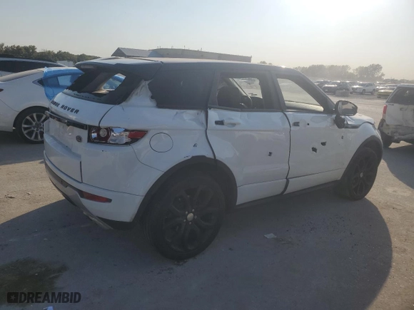 2015 Land Rover Range Rover Evoque Dynamic with VIN SALVT2BG0FH033439, listed as a Copart auction lot 74969444 with 0 mi miles and Salvage Title. Bid and sale history available at carsss.com. Image 3.