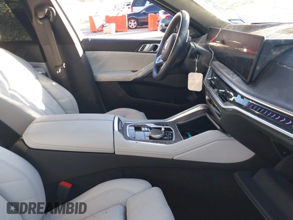 2024 BMW X6 xDrive40i with VIN 5UX33EX02R9T41673, listed as a IAAI auction lot 41427201 with 14,266 mi miles. Bid and sale history available at carsss.com. Image 5.