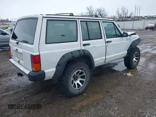 1990 Jeep Cherokee with VIN 1J4FJ78L0LL217723, listed as a IAAI auction lot 41788403 with 147,557 mi miles and . Bid and sale history available at DreamBid. Image 4.