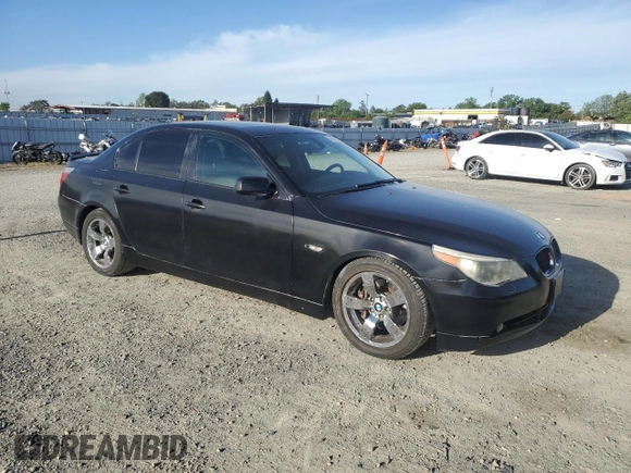 2005 BMW 5 Series 545i with VIN WBANB33565CN65980, listed as a Copart auction lot 52961975 with 143,772 mi miles and Salvage Title. Bid and sale history available at carsss.com. Image 4.