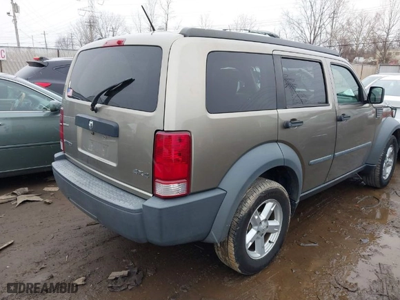 2007 Dodge Nitro SXT with VIN 1D8GU28K37W554484, listed as a IAAI auction lot 41565252 with 156,717 mi miles. Bid and sale history available at carsss.com. Image 4.