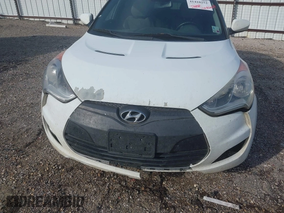 2013 Hyundai Veloster w/Gray Int with VIN KMHTC6AD4DU140121, listed as a IAAI auction lot 41410252 with 202,596 mi miles and . Bid and sale history available at DreamBid. Image 12.