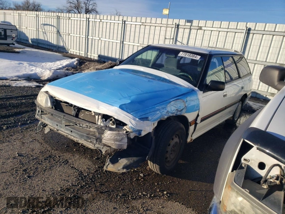 1994 Subaru Legacy L with VIN 4S3BJ6335R9948773, listed as a Copart auction lot 77018384 with 189,202 mi miles and Clean title. Bid and sale history available at DreamBid. Image 1.