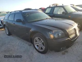 2005 Dodge Magnum RT z VIN 2D8GV58285H550215, wystawiony jako Copart lot #77601924 z przebiegiem 194 701 mil mil oraz Nie do naprawy • Non repairable. Historia ofert i sprzedaży dostępna na DreamBid. Obrazek 4.