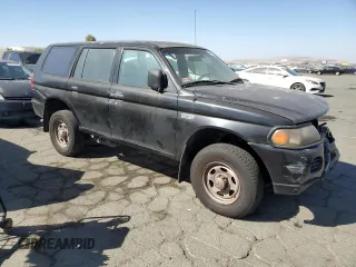 2001 Mitsubishi Montero ES z VIN JA4LS21H11P045183, wystawiony jako Copart lot #73702024 z przebiegiem 263 746 mil mil oraz Szkody całkowita. Historia ofert i sprzedaży dostępna na DreamBid. Obrazek 4.