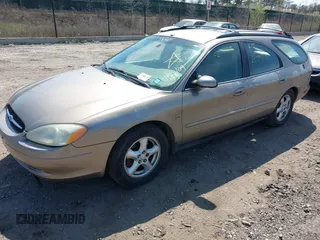 2003 Ford Taurus SE Standard with VIN 1FAHP58S13A147675, listed as a IAAI auction lot 42079930 with 87,523 mi miles and . Bid and sale history available at DreamBid. Image 2.