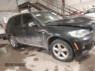 2012 BMW X5 35i with VIN 5UXZV4C50CL757568, listed as a IAAI auction lot 41315024 with 166,825 mi miles and . Bid and sale history available at DreamBid. Image 12.