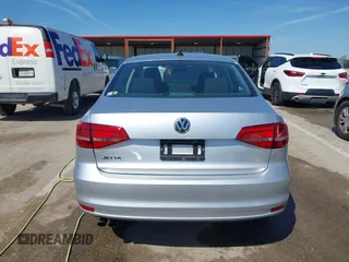 2015 Volkswagen Jetta Sedan 2.0L S with VIN 3VW2K7AJXFM423061, listed as a IAAI auction lot 42083522 with 161,028 mi miles. Bid and sale history available at carsss.com. Image 16.