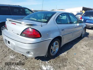 2003 Pontiac Grand Am GT with VIN 1G2NW52E13M612218, listed as a IAAI auction lot 41478495 with 242,179 mi miles. Bid and sale history available at carsss.com. Image 4.