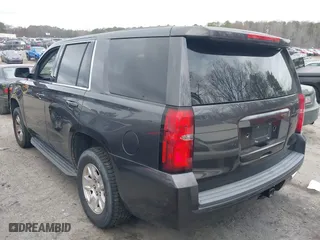 2017 Chevrolet Tahoe Commercial with VIN 1GNLCDEC0HR303602, listed as a IAAI auction lot 41718630 with 196,484 mi miles. Bid and sale history available at carsss.com. Image 3.