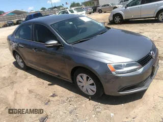 2014 Volkswagen Jetta SE z VIN 3VWD17AJ1EM412833, wystawiony jako IAAI lot #42351497 z przebiegiem 106 705 mil mil oraz . Historia ofert i sprzedaży dostępna na DreamBid. Obrazek 1.